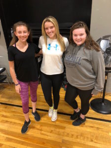 Fashion Focus volunteers (l-r) Skylar Shickel of Hingham, Michaela Cowing of Hanover, and Gianna Salvucci of Rockland. 